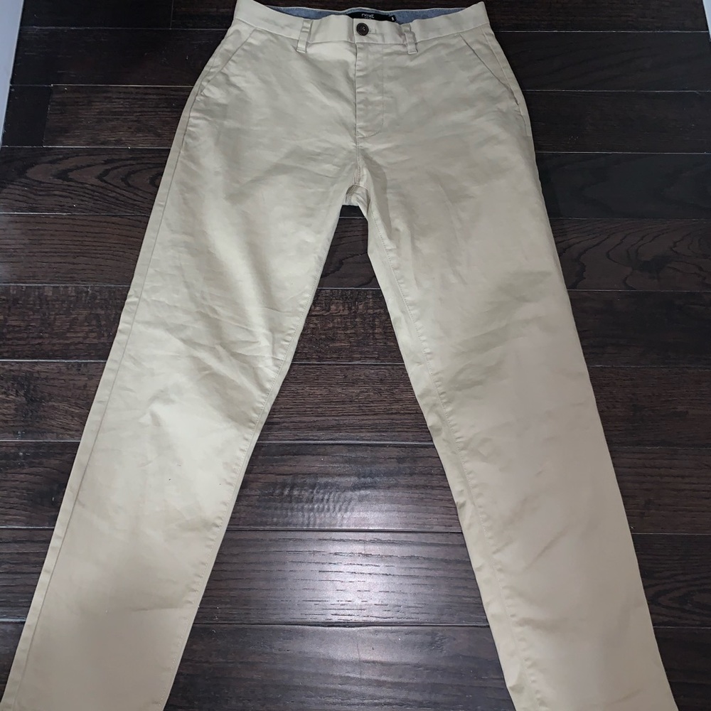 beige / white khaki pants